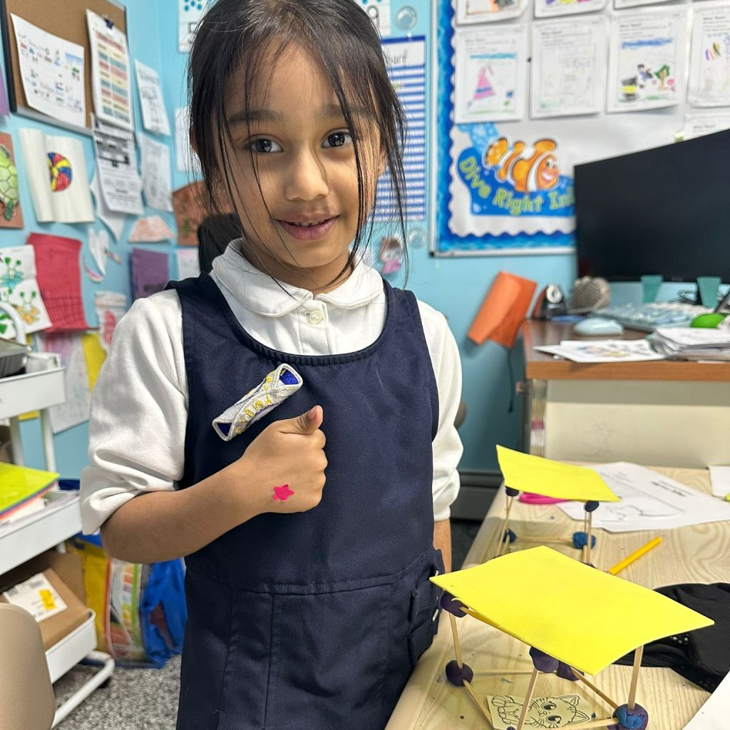 For our STEAM class, KG students were challenged to put on their engineering hats and construct a shelter for a little kitty with limited materials. This lesson enhances their critical thinking and problem-solving skills.